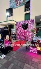 Photo booth guests posing at an event