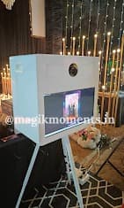 Open-air glam booth with event styling